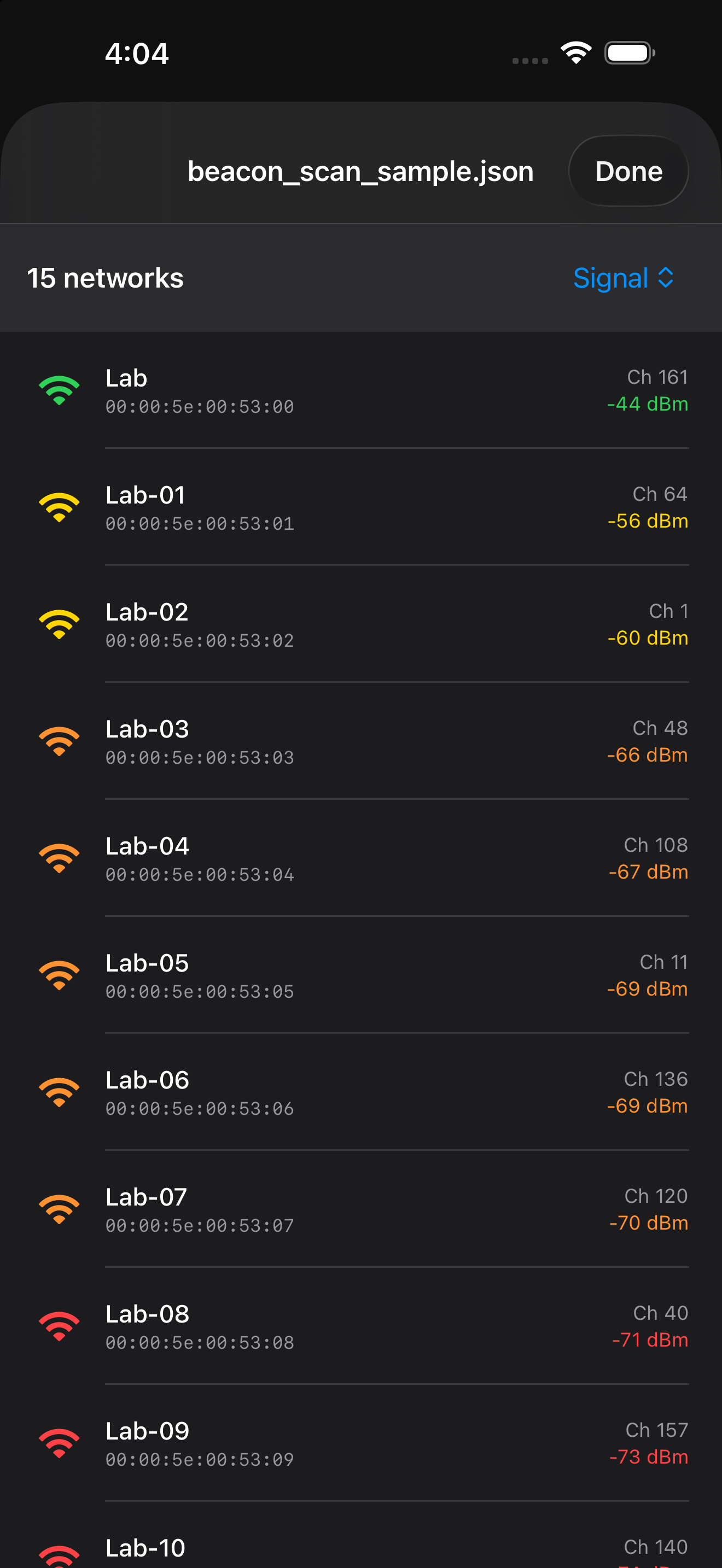 WLAN Commander on iPhone showing sample networks with channels and signal strengths